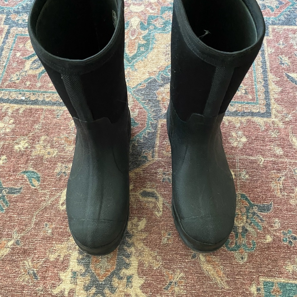 Muck brand boots.